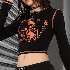Black and Orange Skeleton Graphic Long Sleeve Crop Top